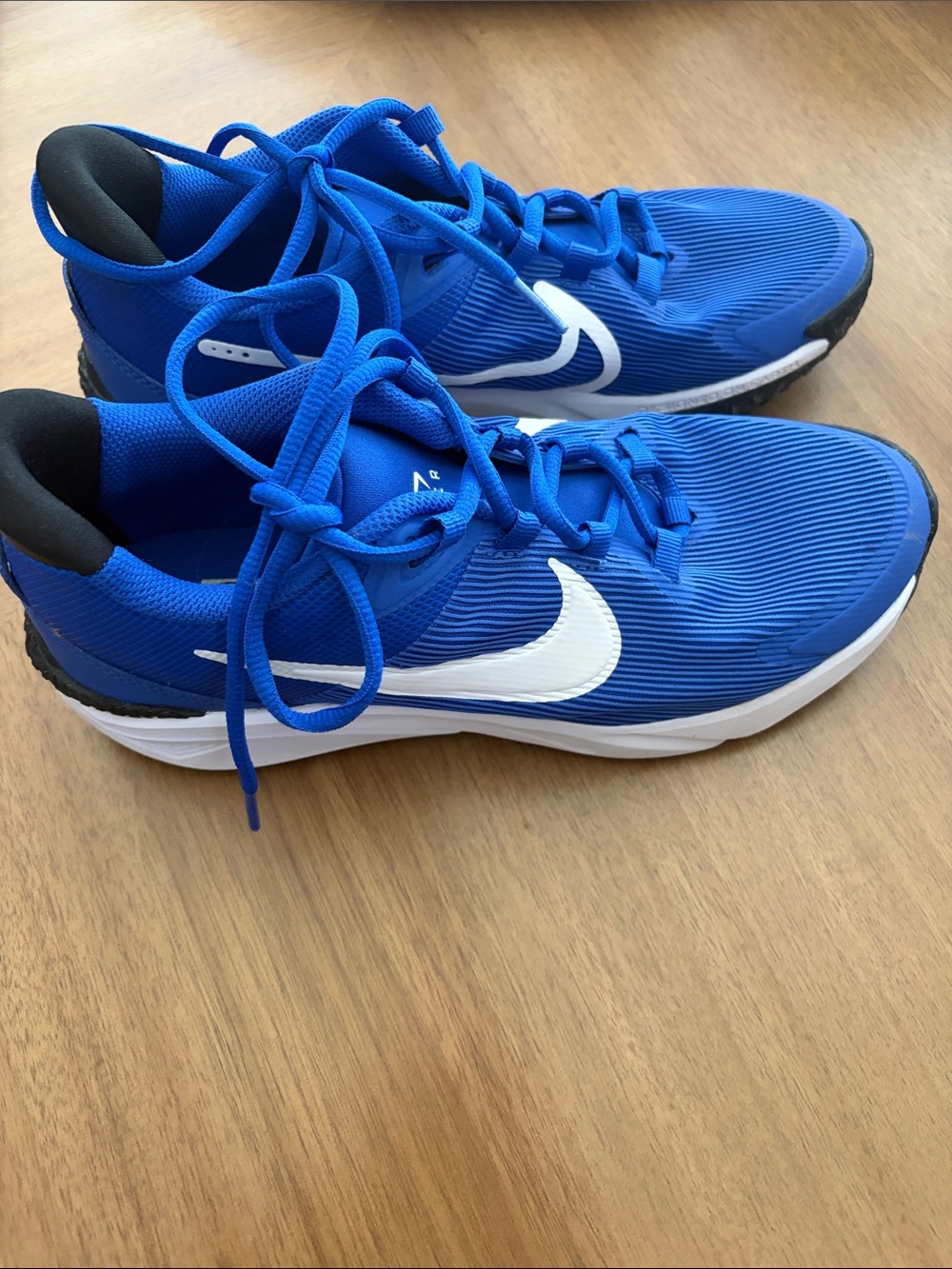 Nike Blue Athletic Sneakers with White Swoosh